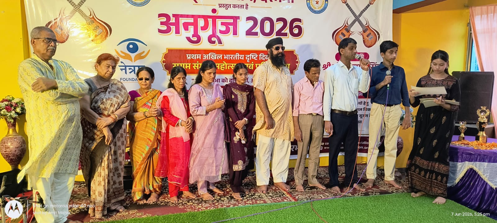 Officials, dignitaries and volunteers on stage